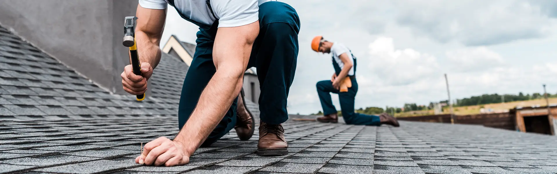 Roof Repair Workers With Tools